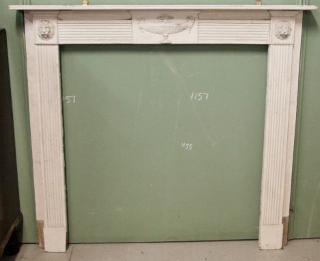 A PAINTED WOODEN MANTELPIECE, in the Adam;s style, the reeded frieze with an urn centre, flanked to either side with lion mas