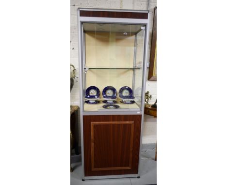 A GOOD PAIR OF MODERN ALUMINIUM AND WOOD SHOP DISPLAY CABINETS, each with down lighting and two sliding glass doors, and glas