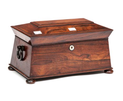 A SARCOPHAGUS-SHAPED WILLIAM IV PERIOD ROSEWOOD TEA CADDY, the top opening to reveal a cut-glass mixing bowl and two canister