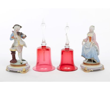 A PAIR OF GERMAN PORCELAIN BISQUE FIGURES, one modelled as a gentleman playing the violin, the other a lady dancing, both app