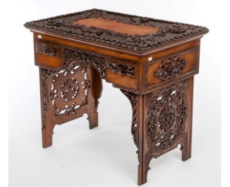 A HIGHLY CARVED CHINESE SIDE TABLE, the top with a centre vacant panel and outer band profusely carved with scrolling vines a