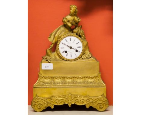 AN EARLY 19TH CENTURY FRENCH ORMOLU BOUDOIR MANTEL CLOCK, the top surmounted with a young peasant girl holding a wounded dove