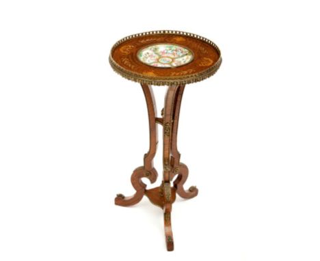 AN ATTRACTIVE FRENCH GRAINED ROSEWOOD AND BRASS MOUNTED JARDINIERE STAND, the circular top with a pierced brass gallery, and 