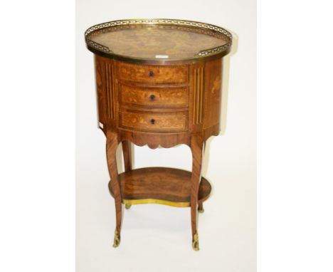 A VERY ATTRACTIVE LATE 19TH CENTURY OVAL MARQUETRY PETITE COMMODE, with three-quarter pierced brass gallery, and rosewood-ban