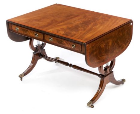 AN INLAID AND CROSSBANDED MAHOGANY SOFA TABLE, with two mock and two frieze drawers, flanked by D-shaped flaps, on double lyr