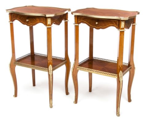 A PAIR OF RECTANGULAR SERPENTINE SHAPED AND BRASS MOUNTED TWO TIER ETAGERES, each inlaid top with a brass edge, on fluted sup