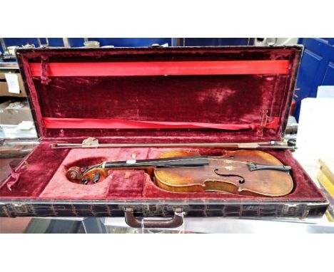 A 'CONSERVATORY' VIOLIN, with paper,'Stradivarius' label, in a crocodile effect case