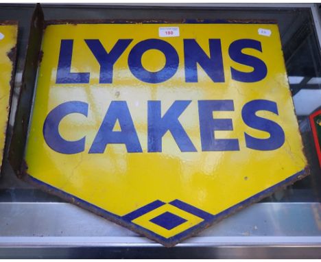 AN EARLY 20TH CENTURY DOUBLE SIDED ENAMEL SIGN, 'LYONS CAKES' 44cm wide 