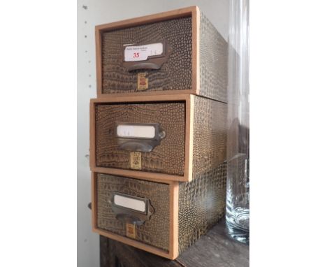 THREE VINTAGE CARD INDEX DRAWERS, with 'crocodile' style embossed paper coverings, circa 1930s
