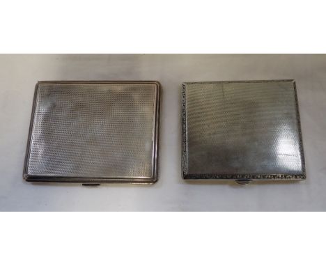 A SILVER ENGINE TURNED CIGARETTE CASE, and a metalware example (c.3.6oz) (2)