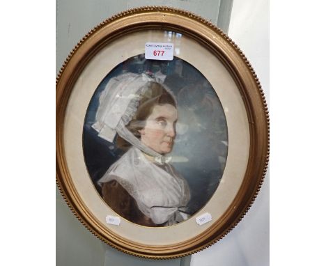PORTRAIT OF A LADY WEARING A BONNET, pastel circa late 18th century, in an oval frame
