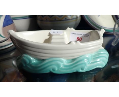 POOLE POTTERY: A 'ROWING BOAT', impressed marks, 18cm long