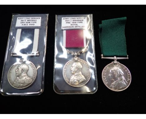 A VICTORIAN MEDAL named for 727.GR.W. Knapman 1 Devon V.A., an Army long service medal Sgt. J Bremner pre 1930 type Royal Gar