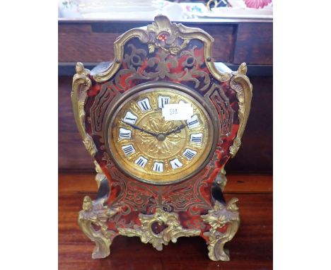A LATE 19TH CENTURY BOULLE MANTLE CLOCK with ormolu mounts, 24cm high