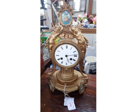 A 19TH CENTURY FRENCH GILT SPELTER MANTEL CLOCK with 'Japy fils' movement with inset blue floral ceramic panels, 37cm high