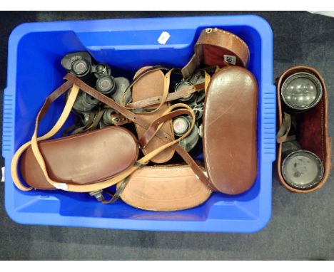 A LARGE COLLECTION OF VINTAGE BINOCULARS, some with leather cases