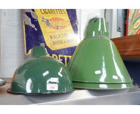 A PAIR OF LARGE GREEN ENAMEL SHADES and another smaller