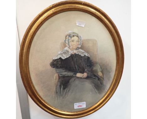 A 19TH CENTURY WATERCOLOUR PORTRAIT OF A WOMAN WEARING A LACE BONNET