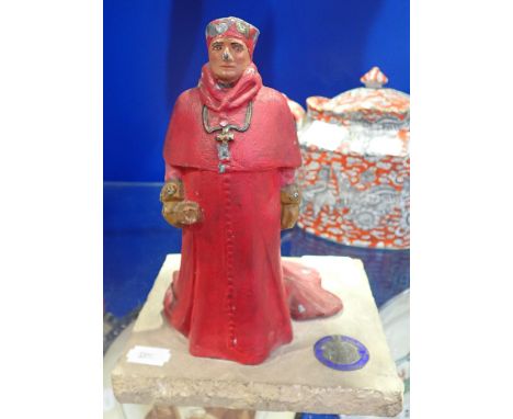 A CAST LEAD STUDY OF CARDINAL WOLSEY on a stone base, from The Houses of Parliament, with inset enamel plaque