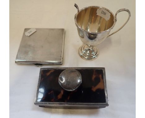 A SILVER ENGINE TURNED CIGARETTE CASE, tortoiseshell and silver desk blotter, and a two-handle cup (c.6.4oz) (3)