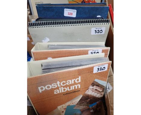 FOUR ALBUMS OF VINTAGE POSTCARDS