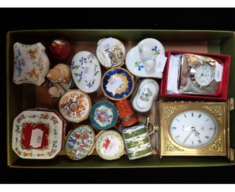 A COLLECTION OF ENAMEL PILL BOXES, two clocks and sundries