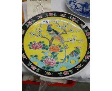 A Japanese bird decorated plate.