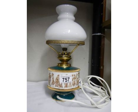 An Italian style ceramic table lamp with glass shade. 30 cm tall.