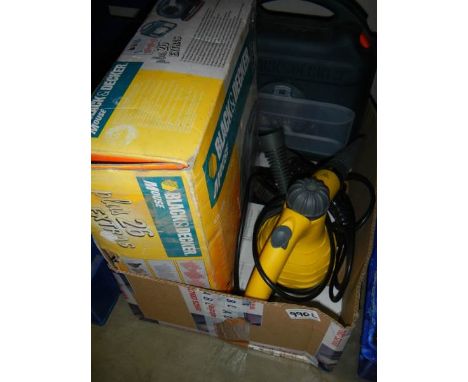 A boxed Black and Decker 'Mouse' sander and a steam cleaner