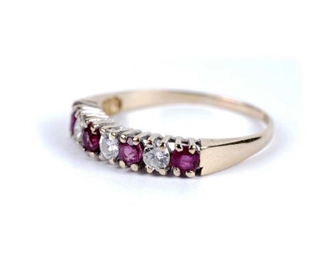 A ruby and diamond half hoop eternity ring, in 18ct yellow gold, size M 1/2, 1.8g gross.