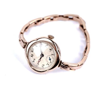 A Rolex lady's 9ct rose gold manual wind cocktail watch, the silvered circular Arabic dial with subsidiary seconds at 6, with