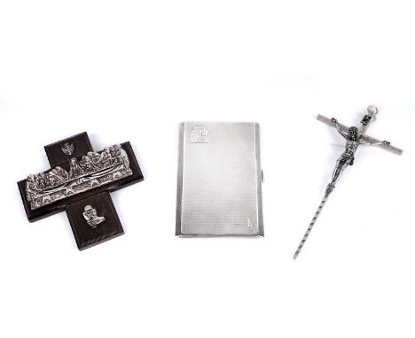 A George V silver cigarette case, by The Northern Goldsmiths Company, Birmingham 1934, 5.8oz gross; a white metal Crucifix; a