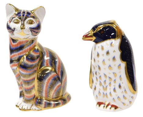 A Royal Crown Derby Imari Rock Hopper penguin paperweight designed by John Ablitt, together with a further paperweight, model