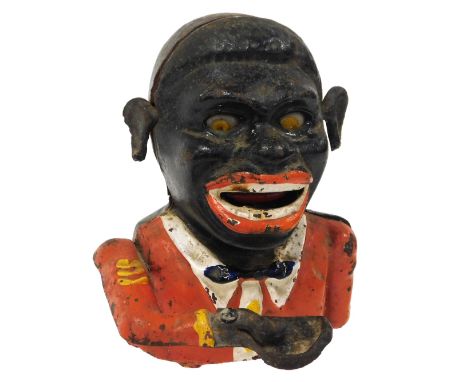 A cast iron jolly money bank, 13cm wide. Notice from the the-saleroom.com: These items are listed on the basis they are illus