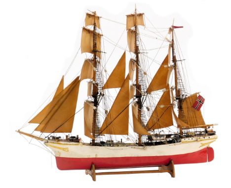 An early 20thC wooden scale model of a Norwegian sailing ship, "Heltodos", with a wooden hull, three fully rigged masts and s