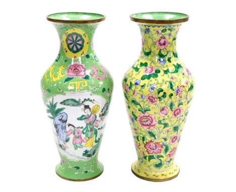 A Chinese famille verte enamel vase, painted with reserves of figures in a garden, birds and flowers, within a ground decorat