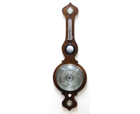 A Regency rosewood wheel barometer, with circular silvered dial, thermometer, dry damp dial and spirit level, the case with m