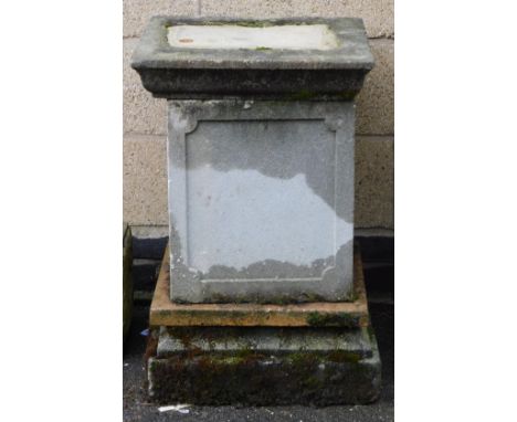 A concrete garden plinth, of square section, 73cm high, 48cm wide, 48cm deep.