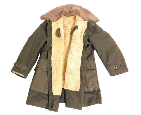 A Mats Larsson Swedish army field coat, M1909, with a sheepskin lining.
