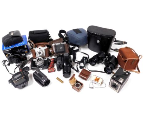 An Olympus IS-1000 digital camera, further cameras, including Balda, Edixa, and Yashica, and a pair of Swift Technar 12x50 bi