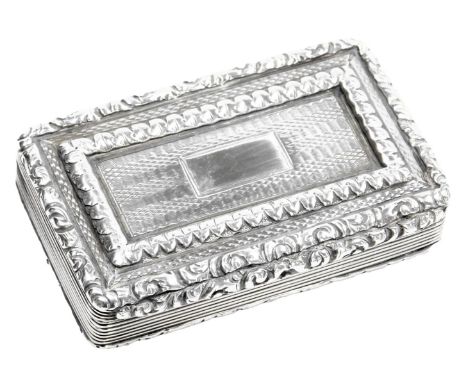A Georgian silver snuff box, with engine turned and gadrooned foliate decoration, hallmarks worn, 2.59oz.