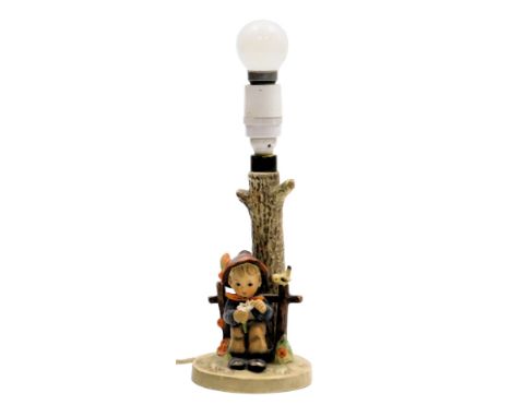 A Hummel pottery table lamp, She Loves Me, She Loves Me Not, number 227, 25.5cm high.