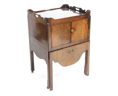 A George III mahogany commode, with a tray top above two doors, with pullout drawer below, raised on chamfered square legs, 8