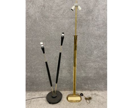 A mid-century French brass and ebonised floor lamp with two branches on a turned three footed  base, along with a mid-century