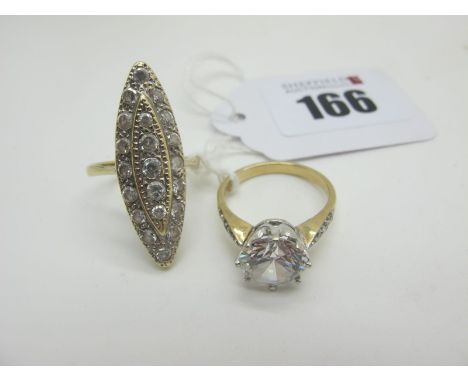 A Modern 9ct Gold Claw Set Dress Ring, between inset shoulders (finger size O1/2) (4grams); an ornate 9ct gold dress ring, of
