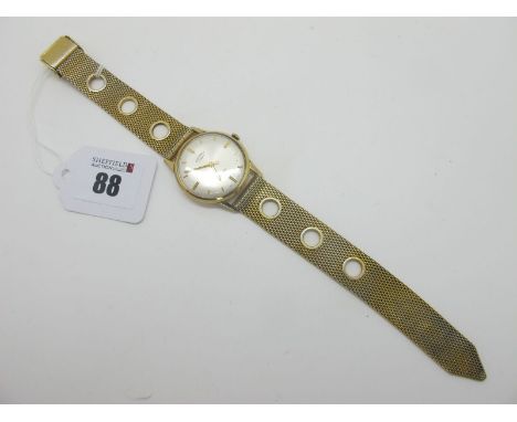 Rotary; A 9ct Gold Cased Gent's Wristwatch, the signed dial with line markers and centre seconds, within plain case (London 1