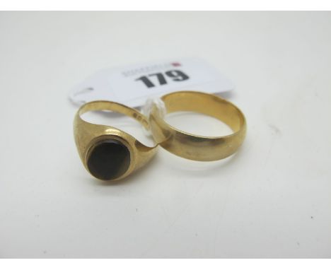 A 9ct Gold Plain Wedding Band, (approximate finger size S) (4.2grams); Together with A 9ct Gold Tiger's Eye Inset Signet Styl