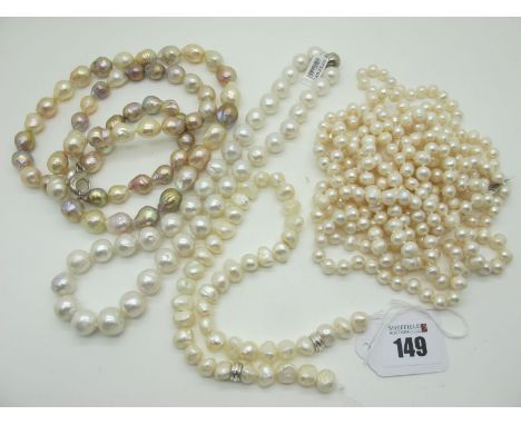 A Long Single Strand Fresh Water Pearl Bead Necklace, together with two further modern pearl necklaces, another part necklace