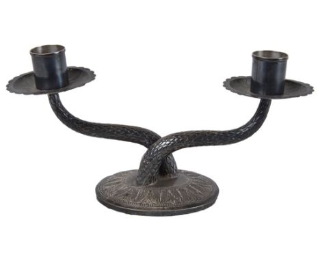 A Middle Eastern Single Two-Light Candelabrum:The arms modelled as a reptile's tail, raised on an oval base