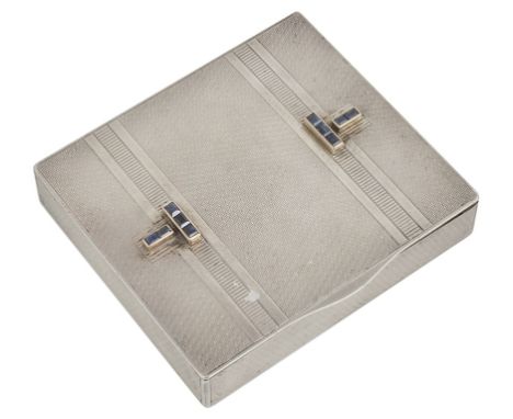 A Silver and Sapphire Set Dunhill Cigarette Box:A silver cigarette case made for the American Market by Dunhill, London, incu